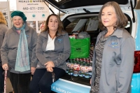 Board members with car